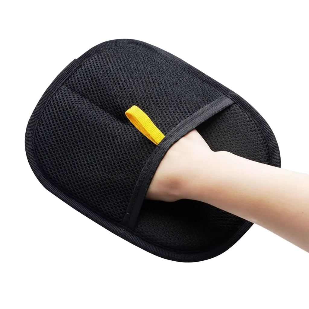 Pet hair removal glove with electrostatic surface
